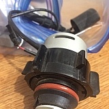 This is an example of OEM type bulbs for my vehicle, note the large screw that is part of the bulb and is used to secure it in the housing.