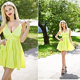 Photoshped breasts so you think the woman has big breasts when in reality most are regular, avg looking women. Photo on left the dress around breasts looks of brighter color