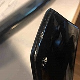 Scratches and chunks taken out of the spoiler.