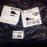 The packaging that the cardigan came in.