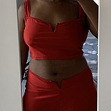 Look at the stitching on the keyhole trim of the pants. Super uneven, crooked, and poorly done.