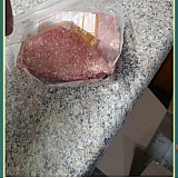 This package of raw ground beef was clearly sliced all the way down and yet someone intentionally sent it in our box anyway.