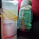Tube of cream, bottle of pills