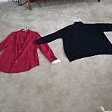 You could put two "boyfriends" in the black sweater. Sizing chart way off.