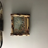 It’s the beautiful frame with my father’s painting I put into it.